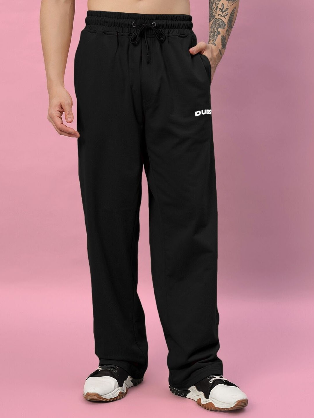 

WEARDUDS Men Printed Mid Rise Relaxed Fit Track pants, Black