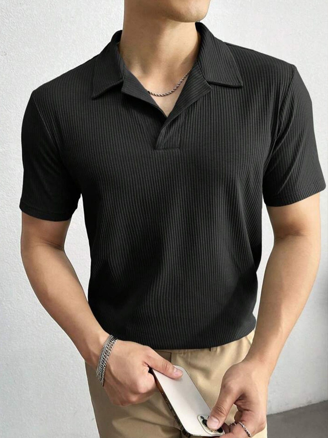 

JUMPCUTS Men Self Design Polo Collar Cotton T-shirt, Black
