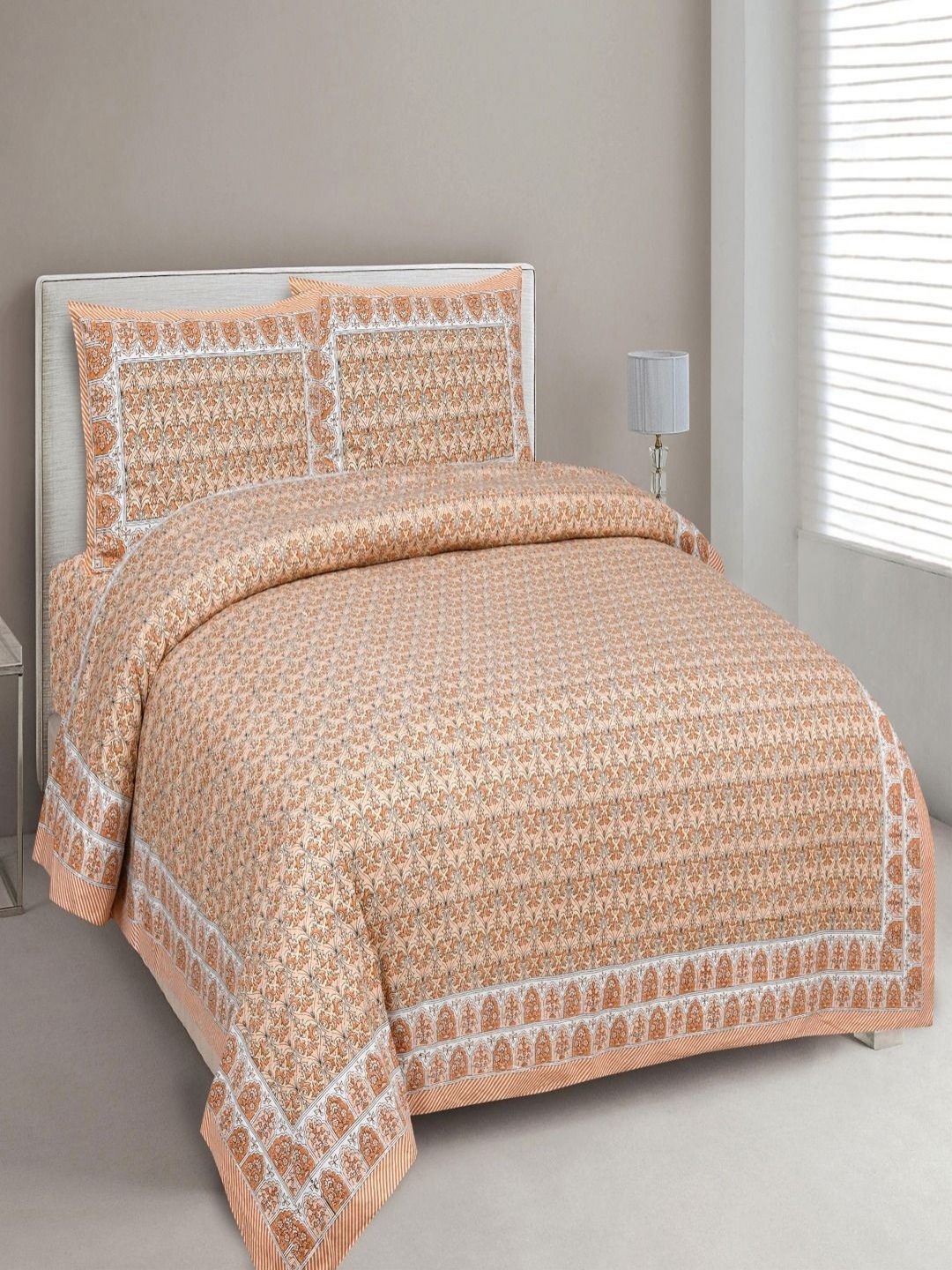 

Myntra Elegant Homes Orange Printed Pure Cotton 180 TC King Bedsheet Set 2.74 m x 2.54m