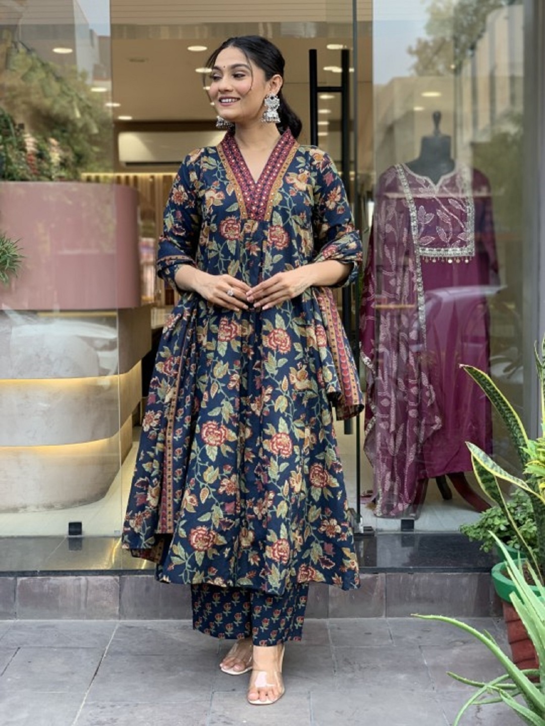 

KALINI Floral Printed V-Neck Pleated A-Line Kurta With Trouser And Dupatta, Navy blue