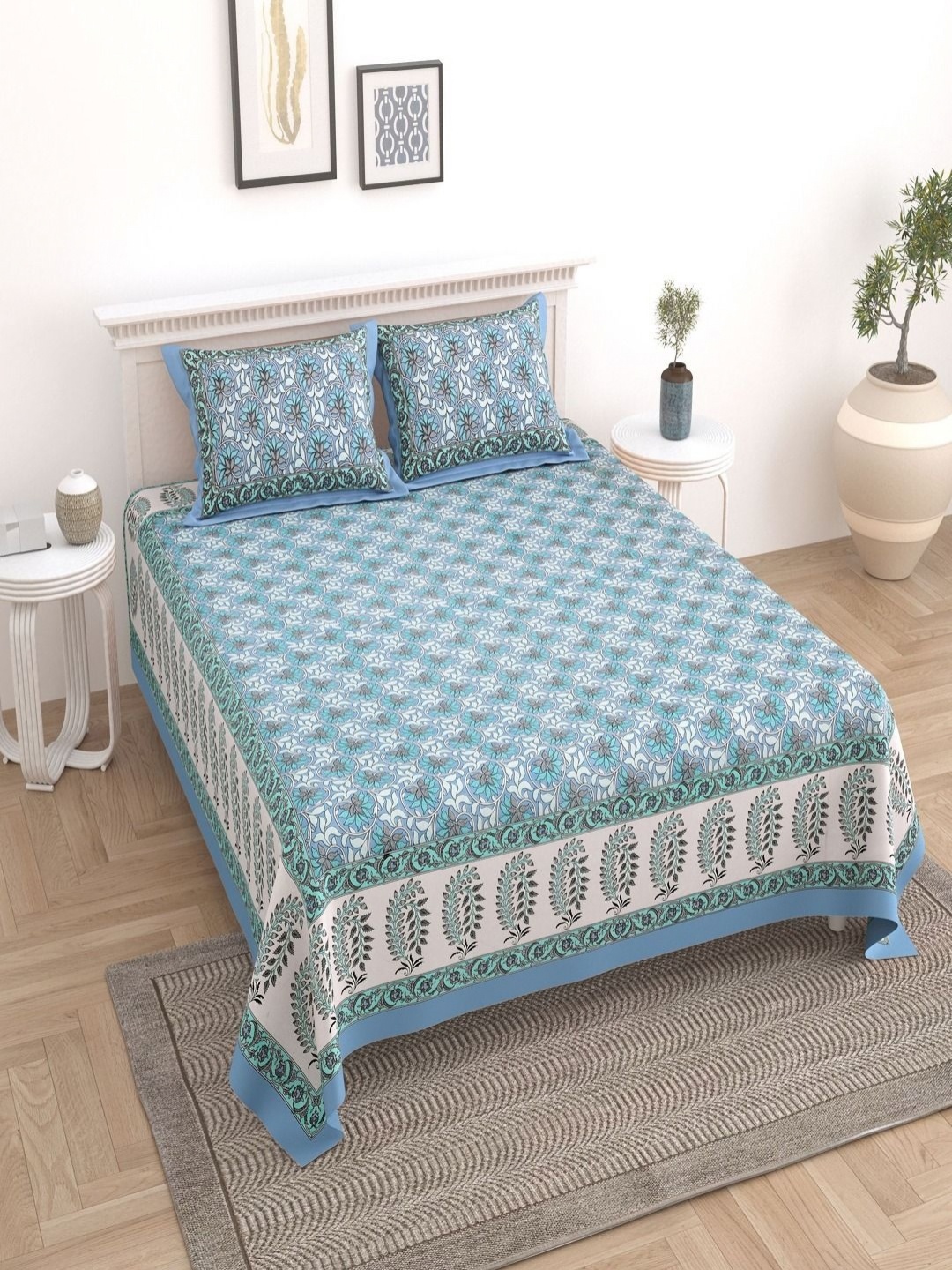 

Myntra Elegant Homes Turquoise Floral Cotton 180 TC King Bedsheet Set- 2.74 m x 2.54 m, Turquoise blue