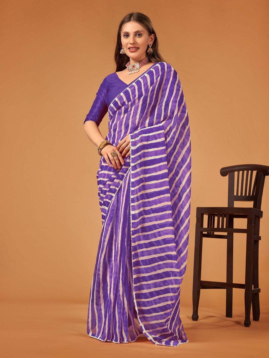 

Moda Rapido Striped Pure Georgette Leheriya Saree, Violet