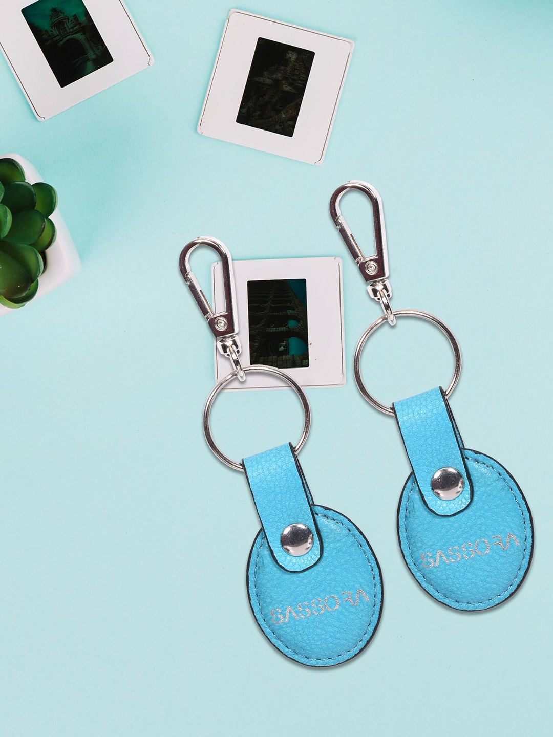 

Sassora Set Of 2 Printed Oval Shape Genuine Leather Key Chains, Blue