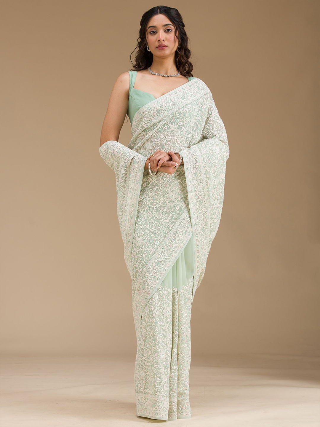 

Koskii Pista Green Threadwork Georgette Saree