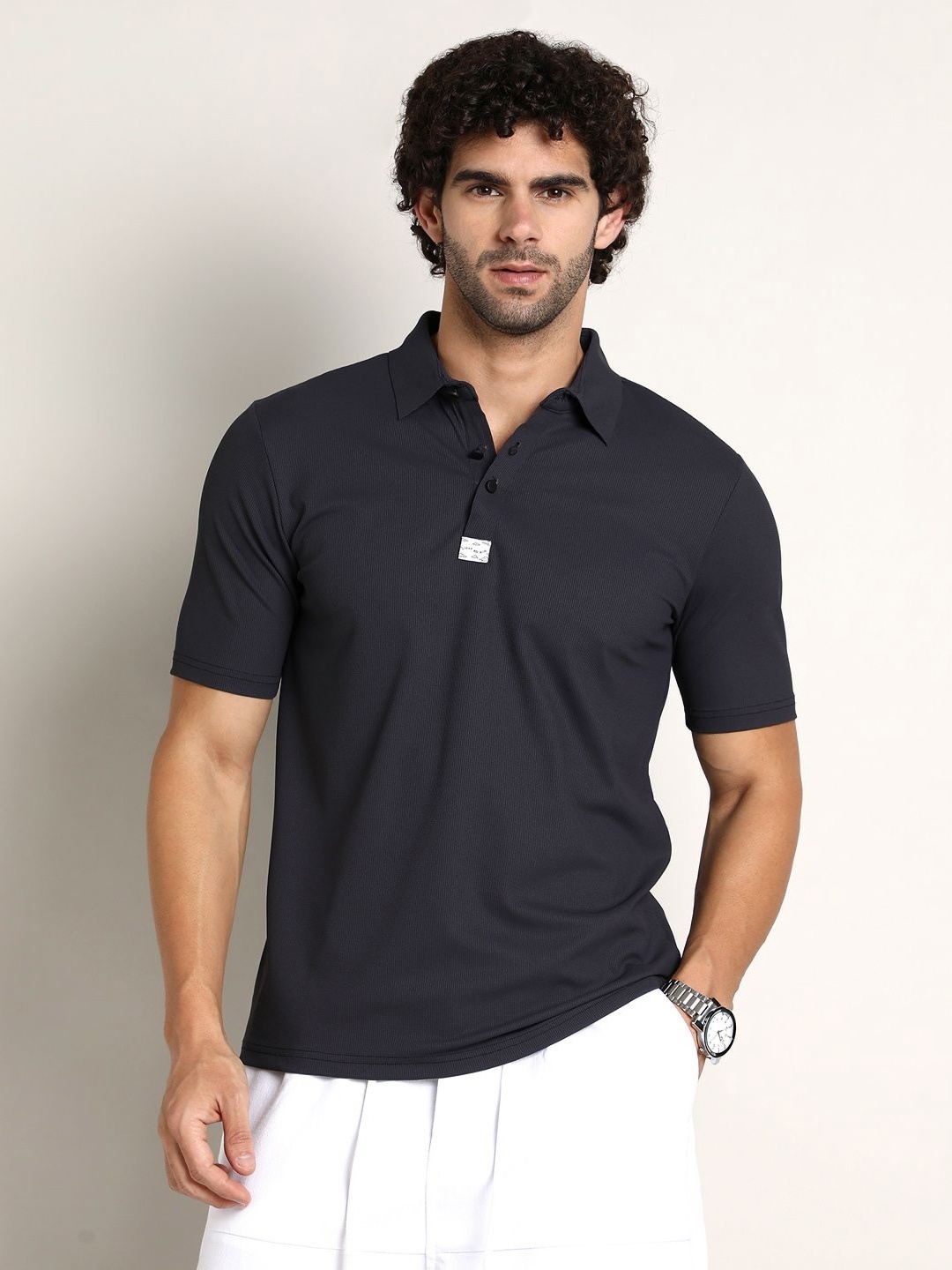 

Campus Sutra Men Solid Polo Collar T-shirt, Black