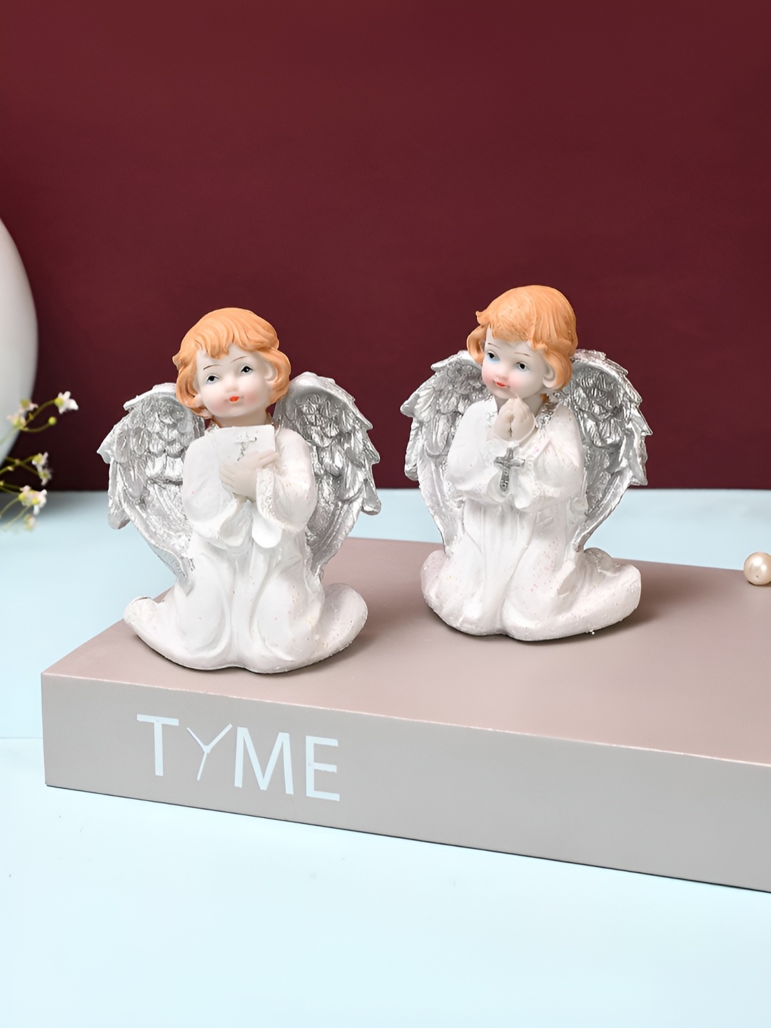

Myntra Elegant Homes White And Brown Set Of 2 Angels Figurine Showpiece