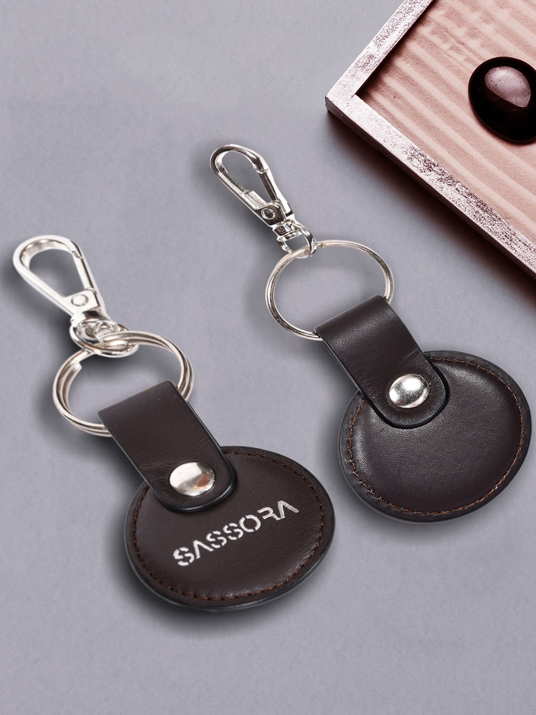 

Sassora Set Of 2 Printed Genuine Leather Round Shape Key Chain, Brown