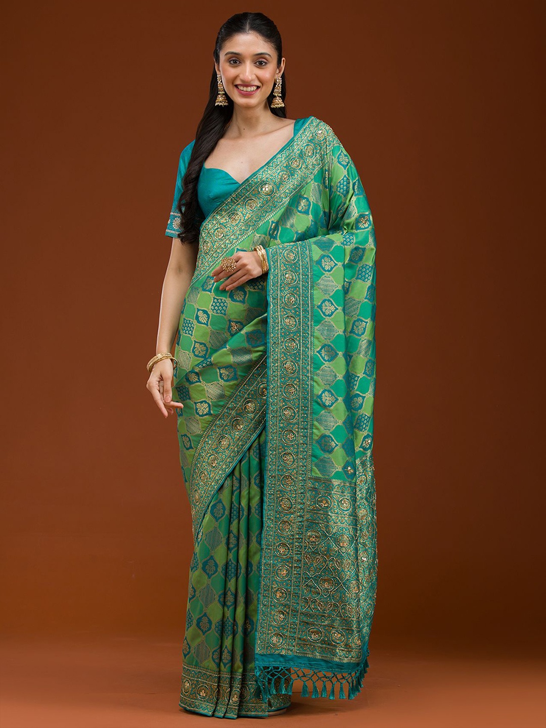 

Koskii Blue Embellished Sequined Art Silk Saree