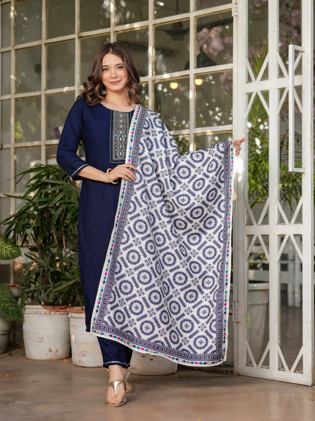 

Moda Rapido Floral Yoke Design Sequinned Straight Kurta With Trousers And Dupatta, Blue