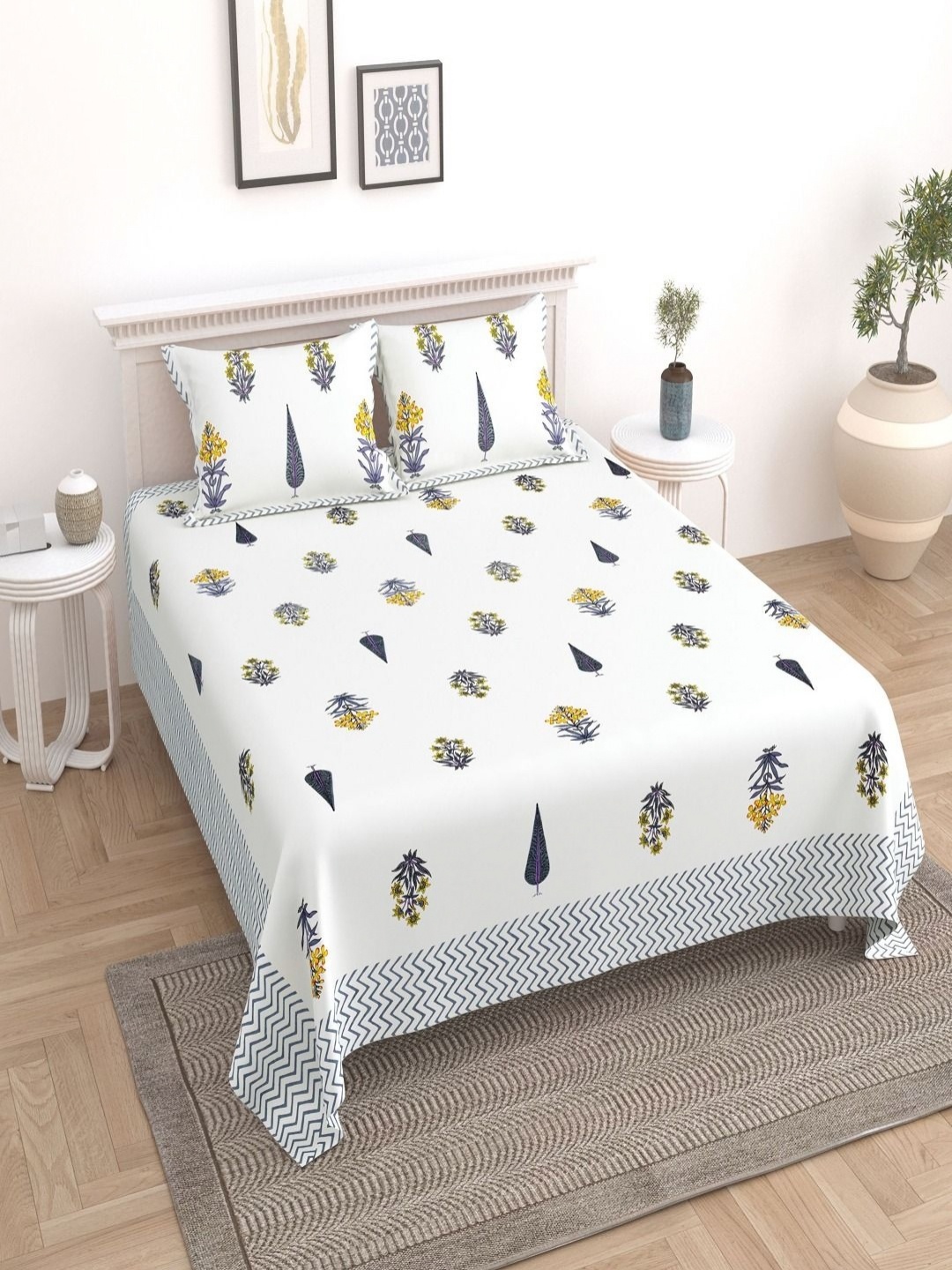 

Myntra Elegant Homes White & Yellow Printed Cotton 180 TC King Bedsheet Set 2.74m x 2.54m