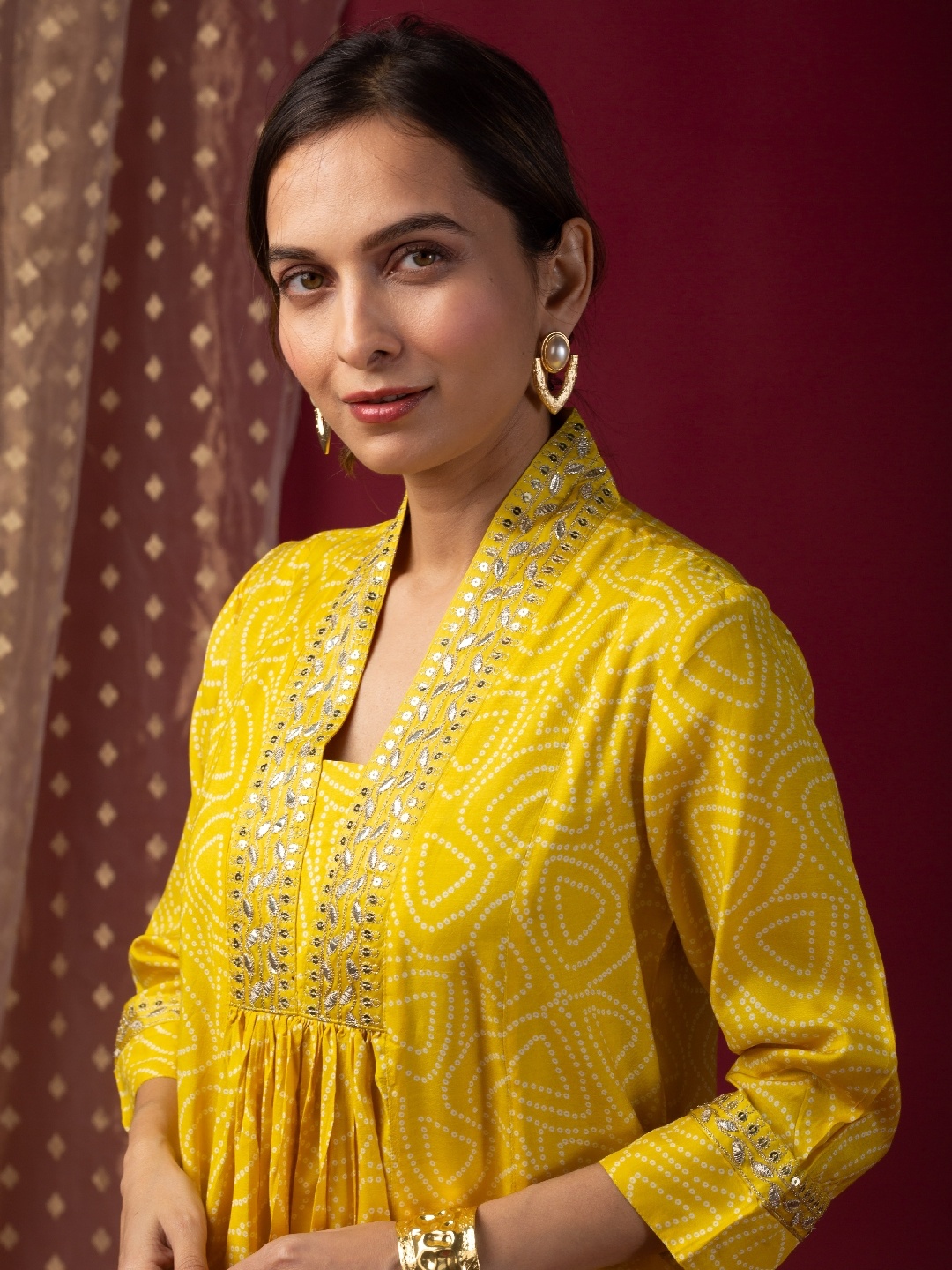 

KUSVAA Bandhani Printed Gotta Patti A-Line Kurta With Trouser, Yellow