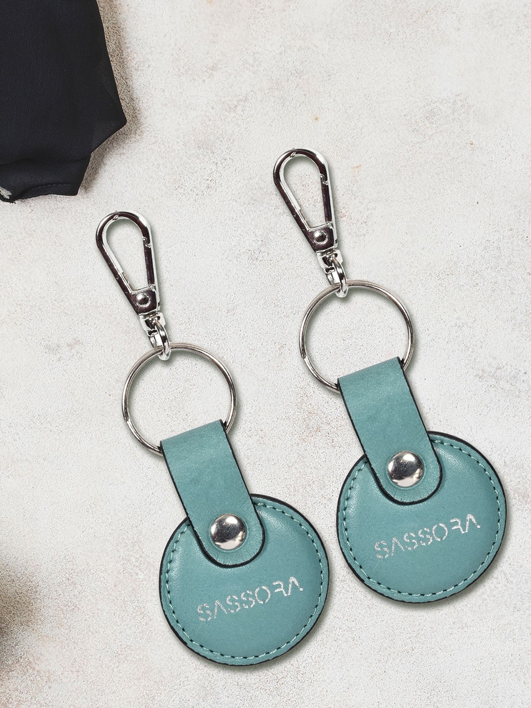 

Sassora Set Of 2 Printed Round Shape Genuine Leather Key Chains, Blue