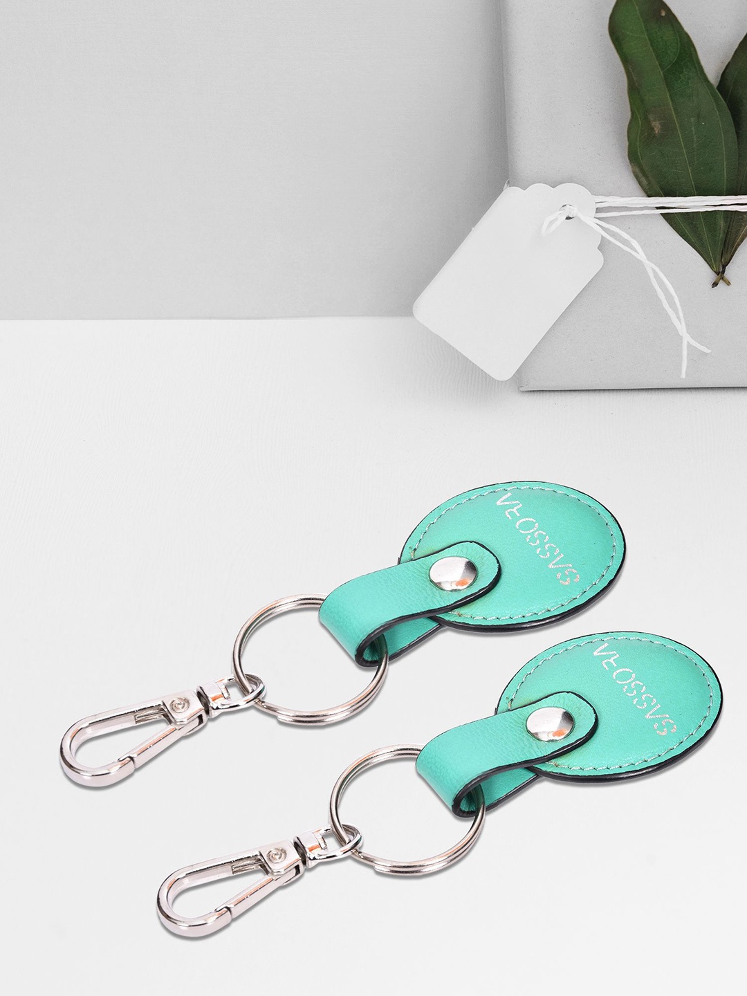 

Sassora Set Of 2 Printed Oval Shape Genuine Leather Key Chains, Sea green
