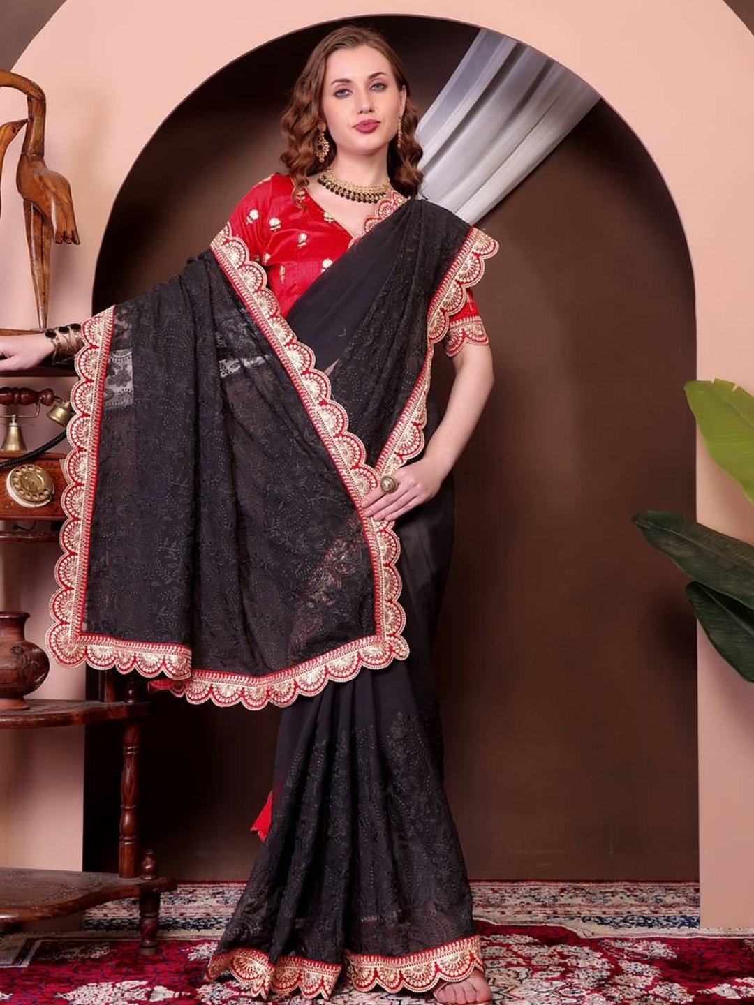 

Moda Rapido Embroidered Pure Georgette Saree, Black