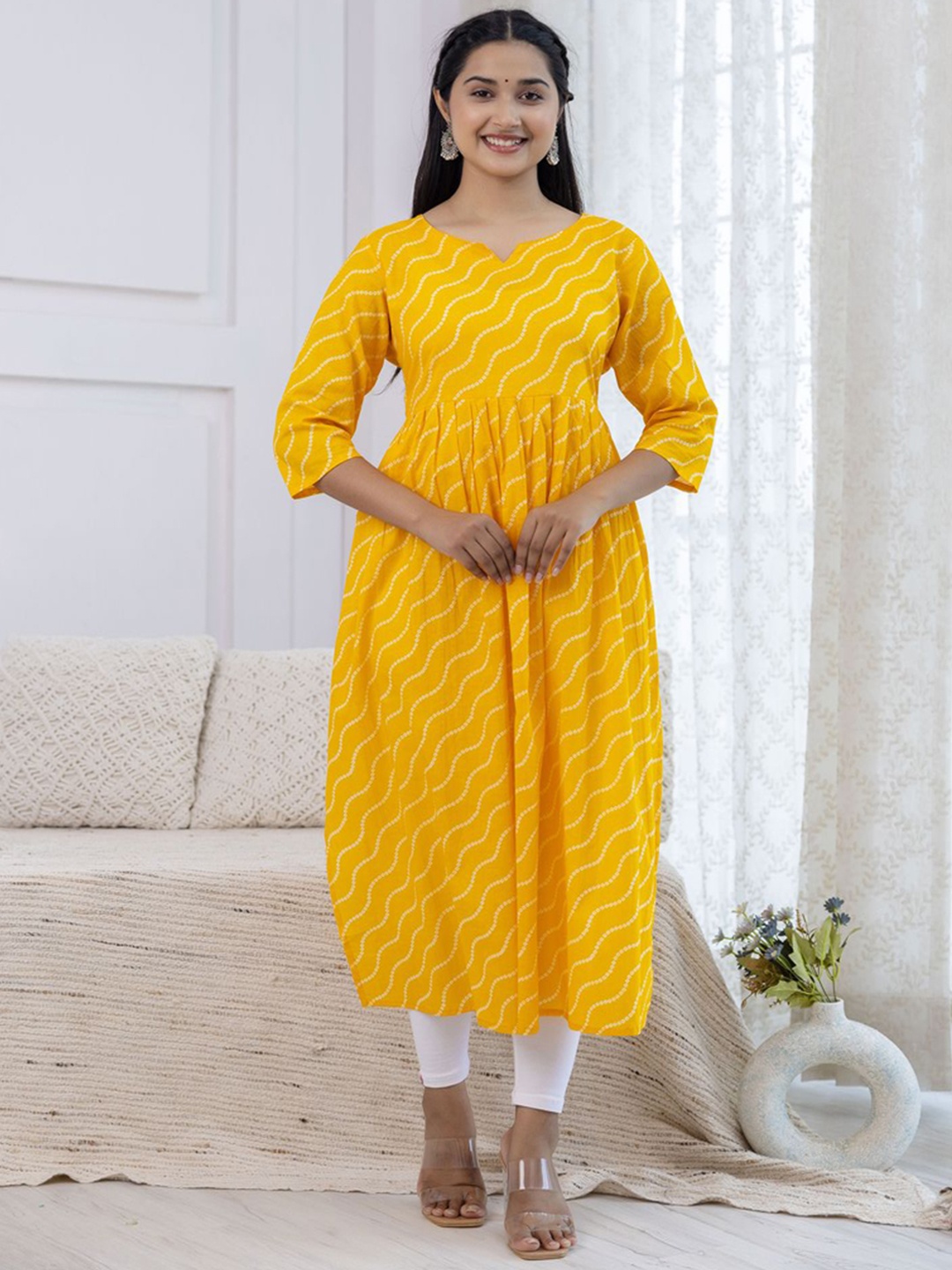 

MERAAKI FASHION Leheriya Printed Notch Neck A-Line Pure Cotton Kurta, Yellow