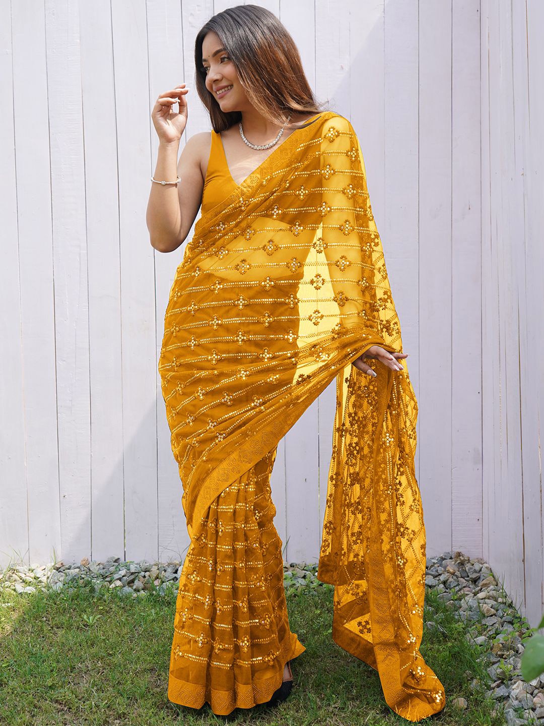 

Panzora Embellished Sequinned Net Designer Saree, Mustard