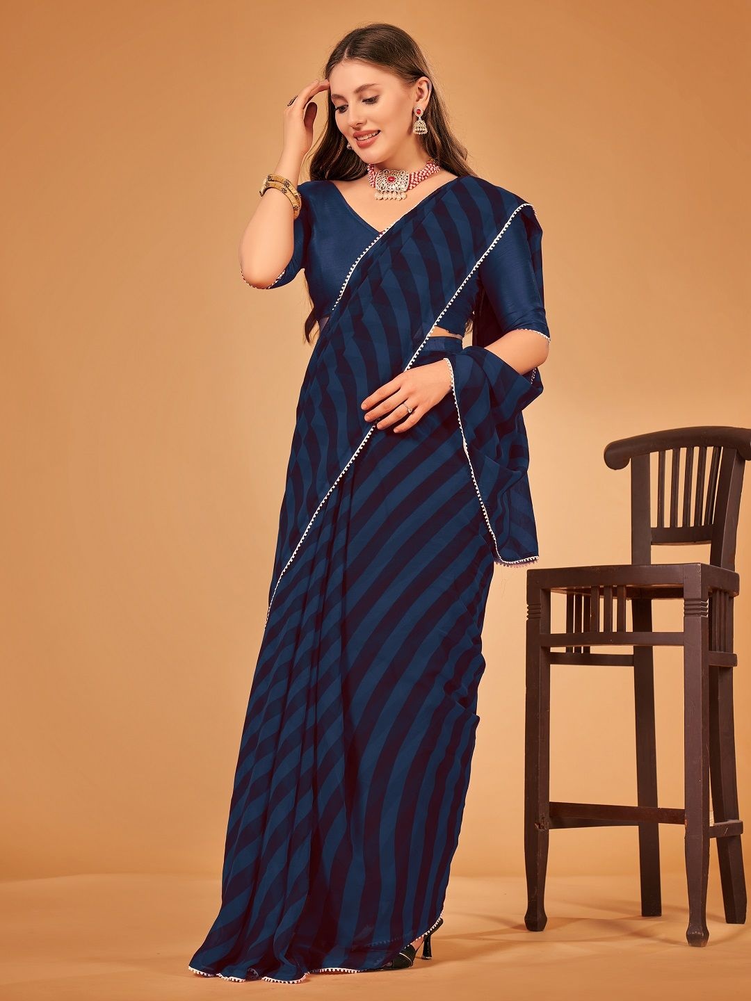 

Moda Rapido Striped Pure Georgette Leheriya Saree, Navy blue