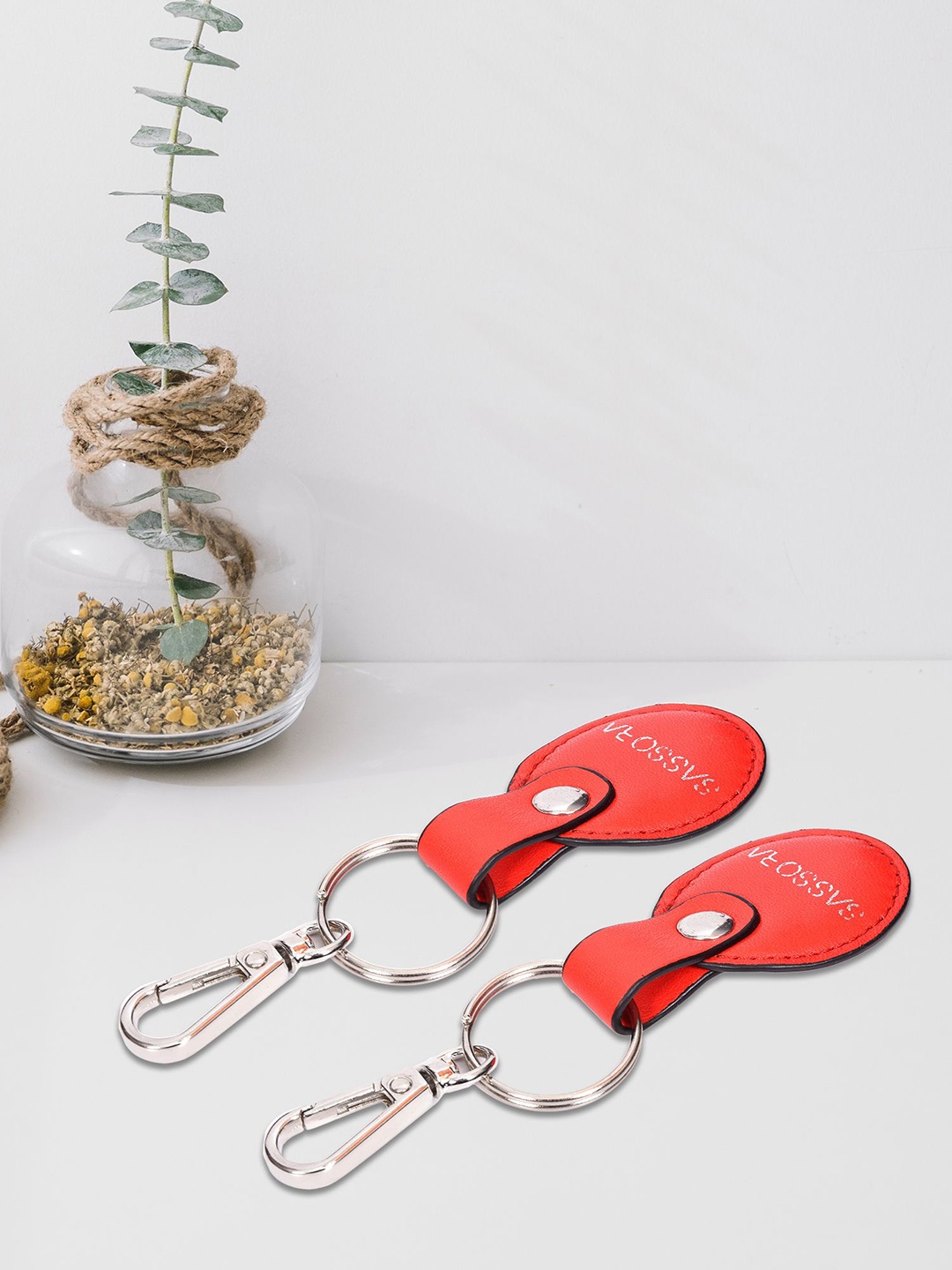 

Sassora Set Of 2 Printed Oval Shape Genuine Leather Key Chains, Red