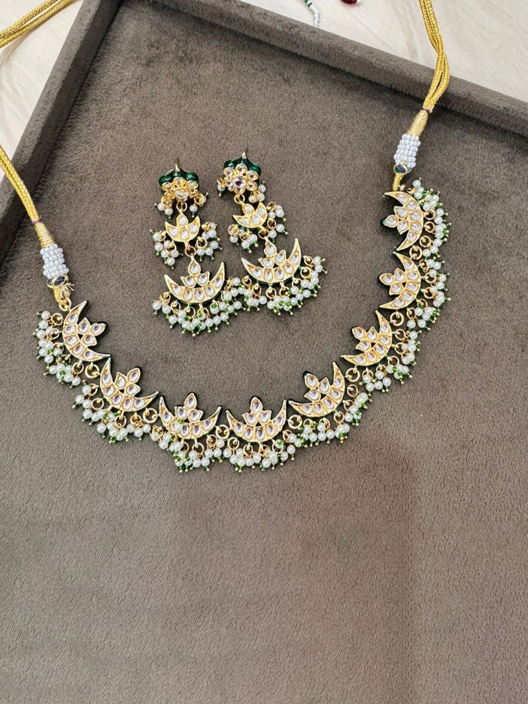 

Queens Jewels Gold-Plated Kundan-Studded And Beaded Jewellery Set
