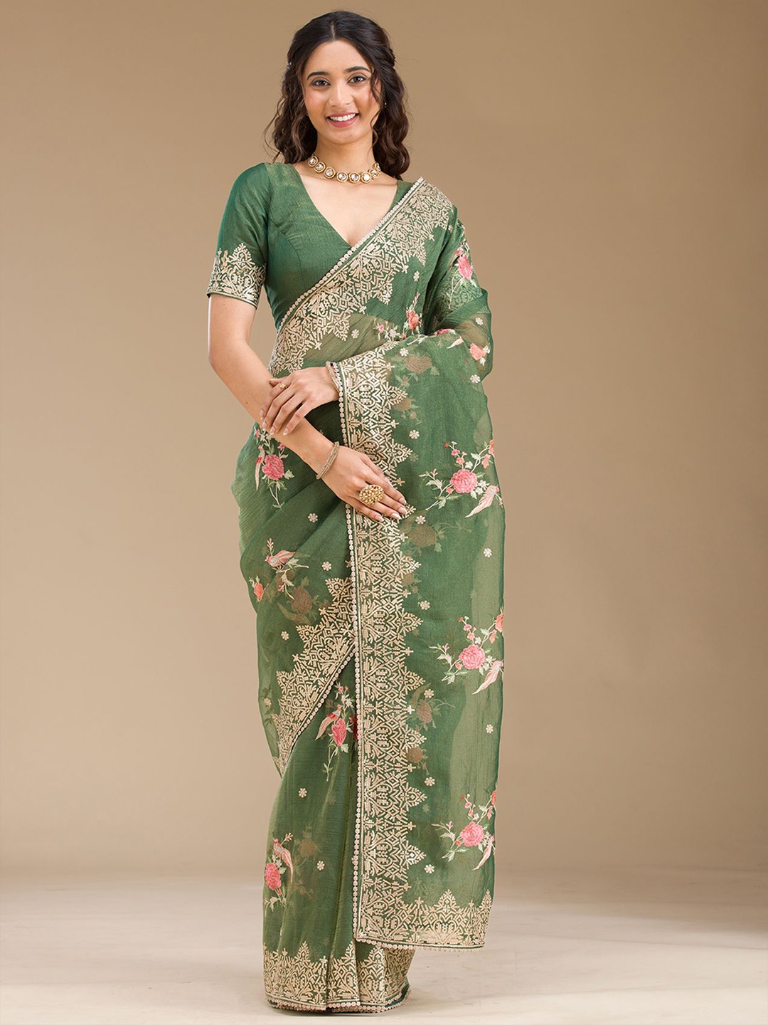 

Koskii Ethnic Motifs Bottle Green Sequins Tissue Saree