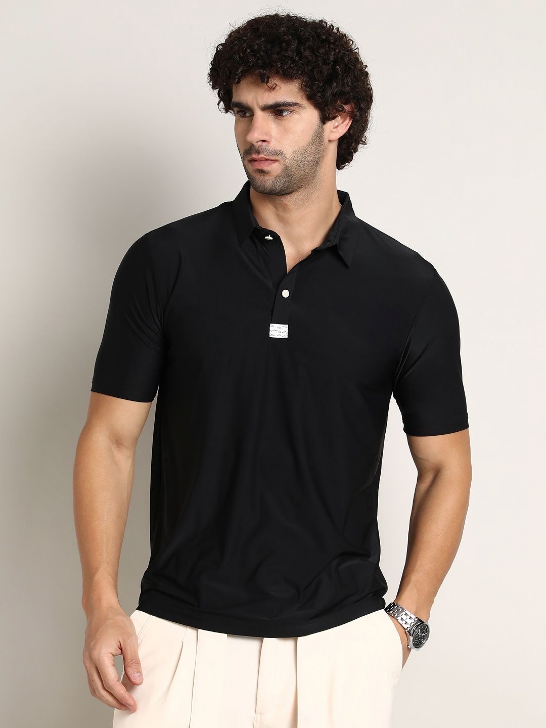 

Campus Sutra Men Solid Polo Collar T-shirt, Black