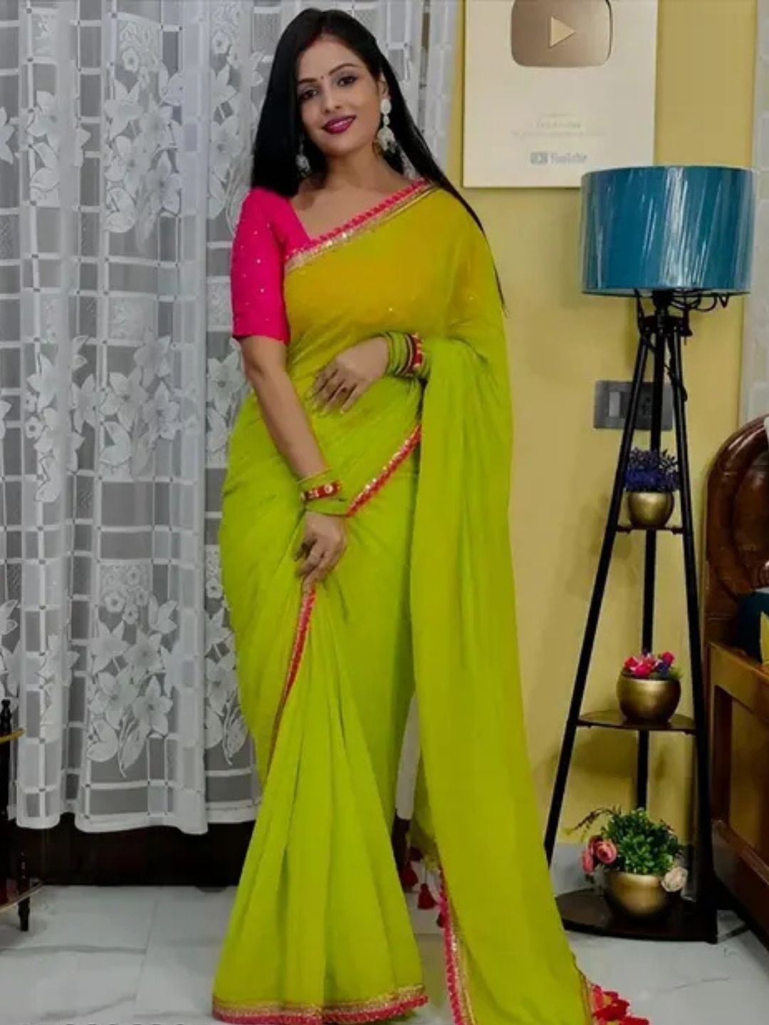 

MAGMINA women Solid Sequinned Pure Georgette Saree, Green