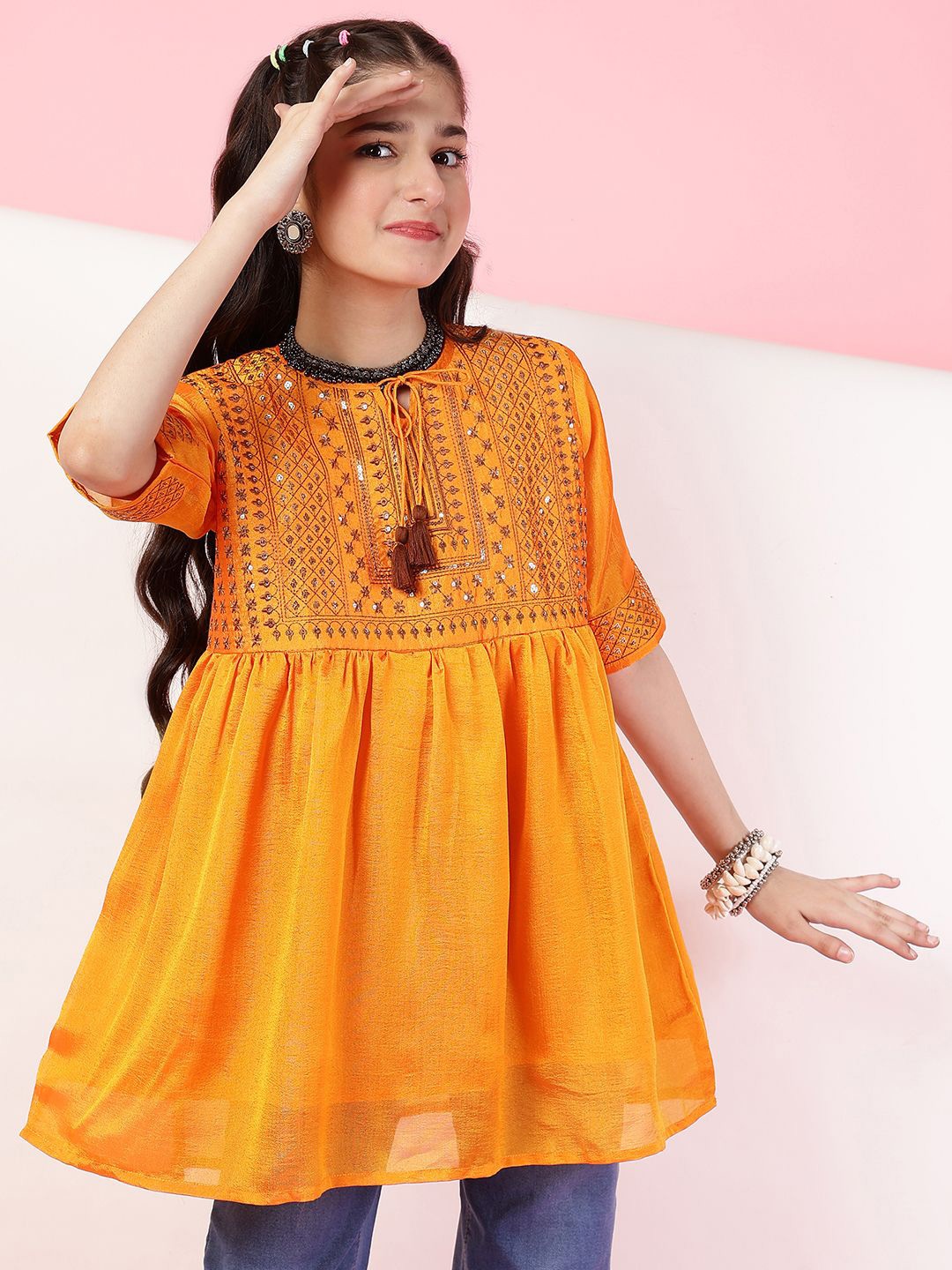 

Ishti Girls Embroidered Tie-Up Neck A-Line Top, Mustard