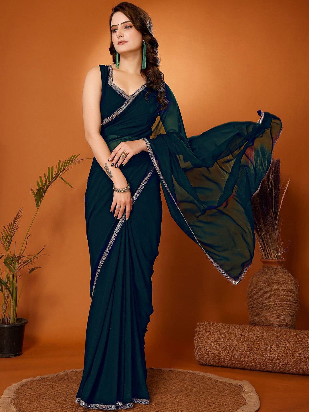 

LeeliPeeri Designer Sequinned Poly Georgette Saree, Teal
