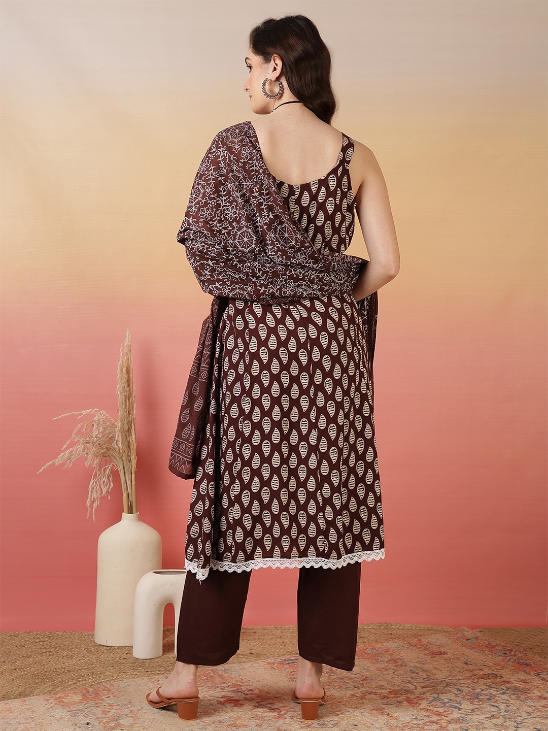 

Sangria Brown Abstract Printed Sleeveless Anarkali Kurta With Trousers And Dupatta