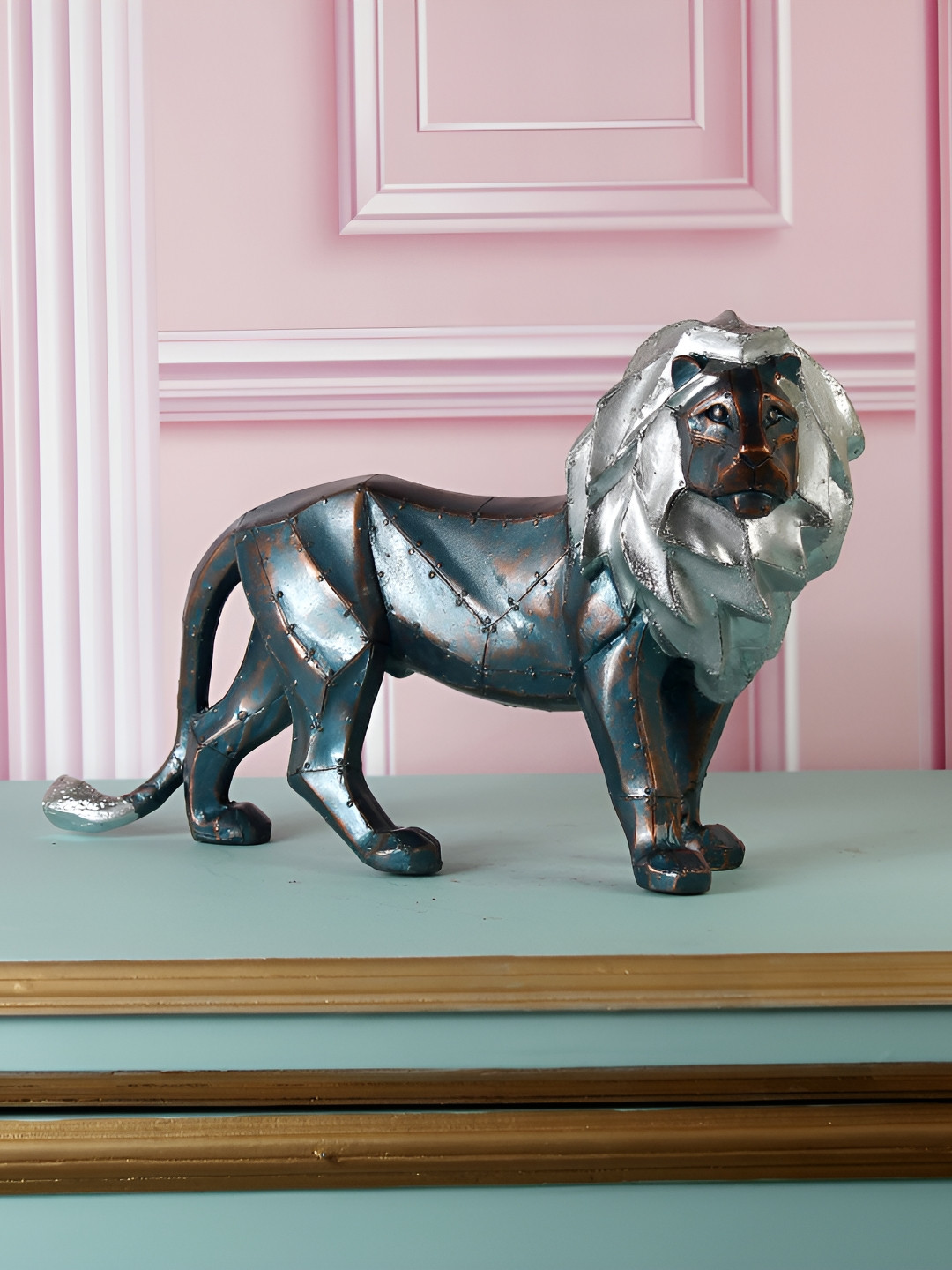 

THE WHITE INK DECOR Silver-Toned And Bronze-Toned Lion Figurine Showpiece