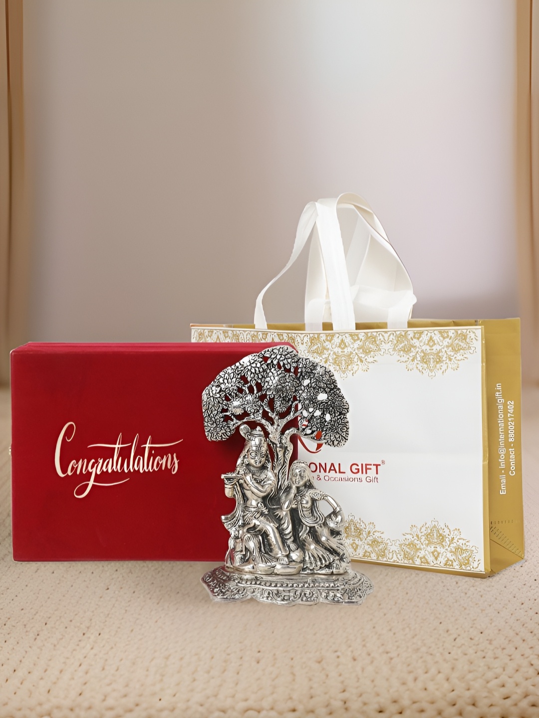 

INTERNATIONAL GIFT Silver-Toned Radha Krishna Religious Idol Showpiece