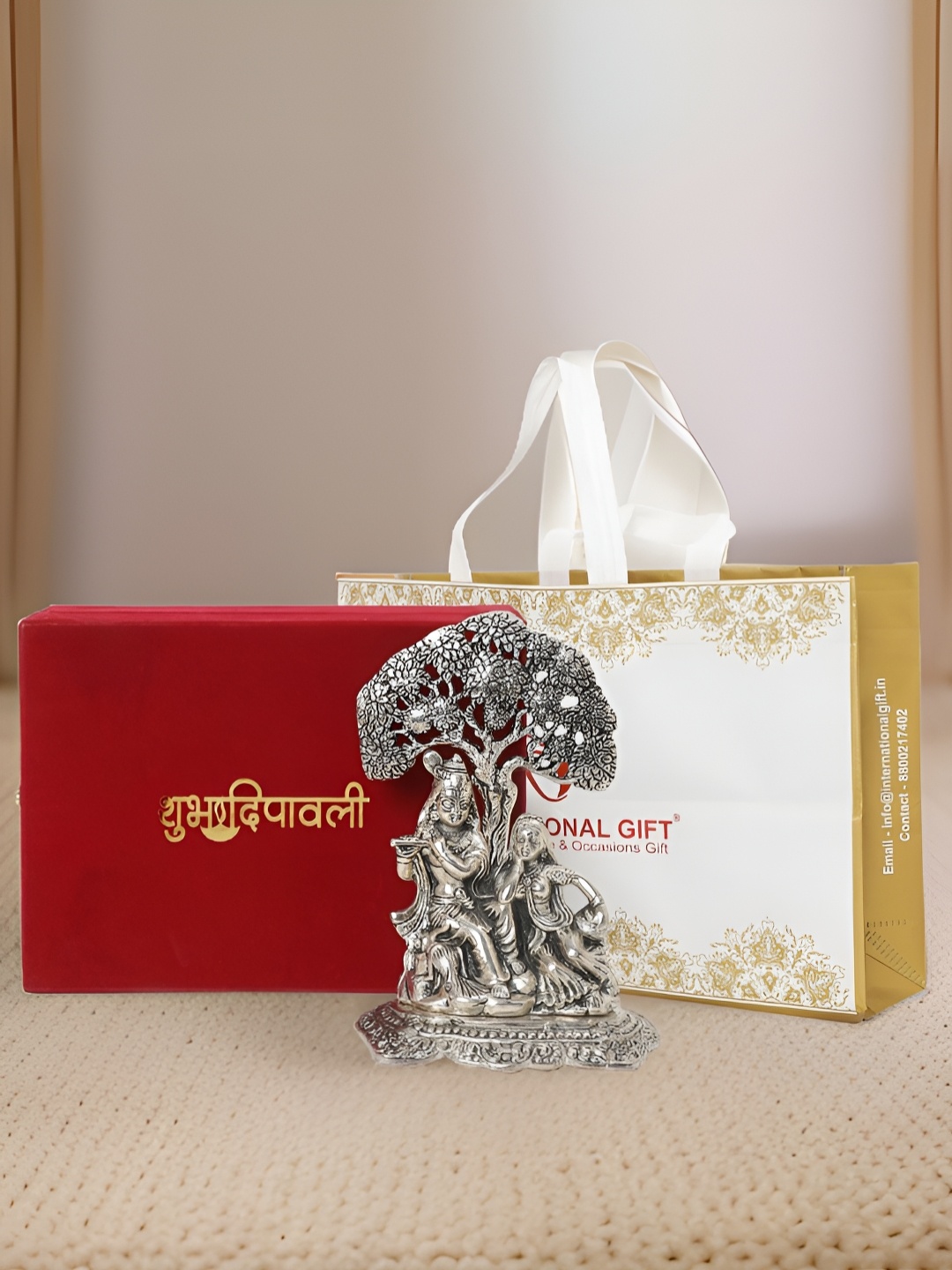 

INTERNATIONAL GIFT Silver-Toned Radha Krishna Religious Idol Showpiece
