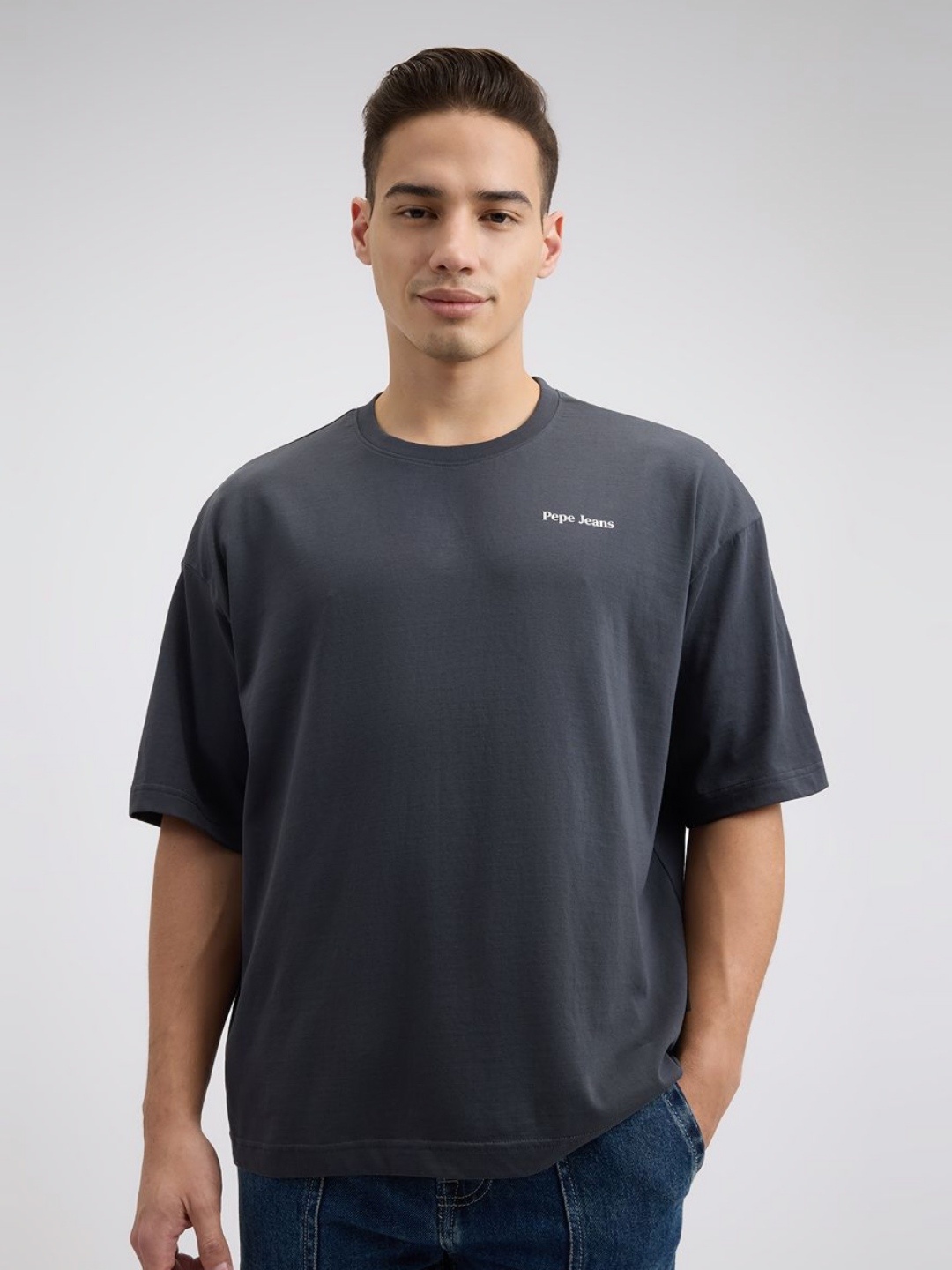 

Pepe Jeans Men Solid Round Neck Cotton Oversized T-shirt, Black