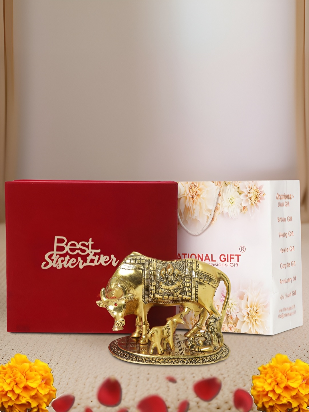 

INTERNATIONAL GIFT Gold-Toned Kamdhenu Cow Religious Idol Showpiece