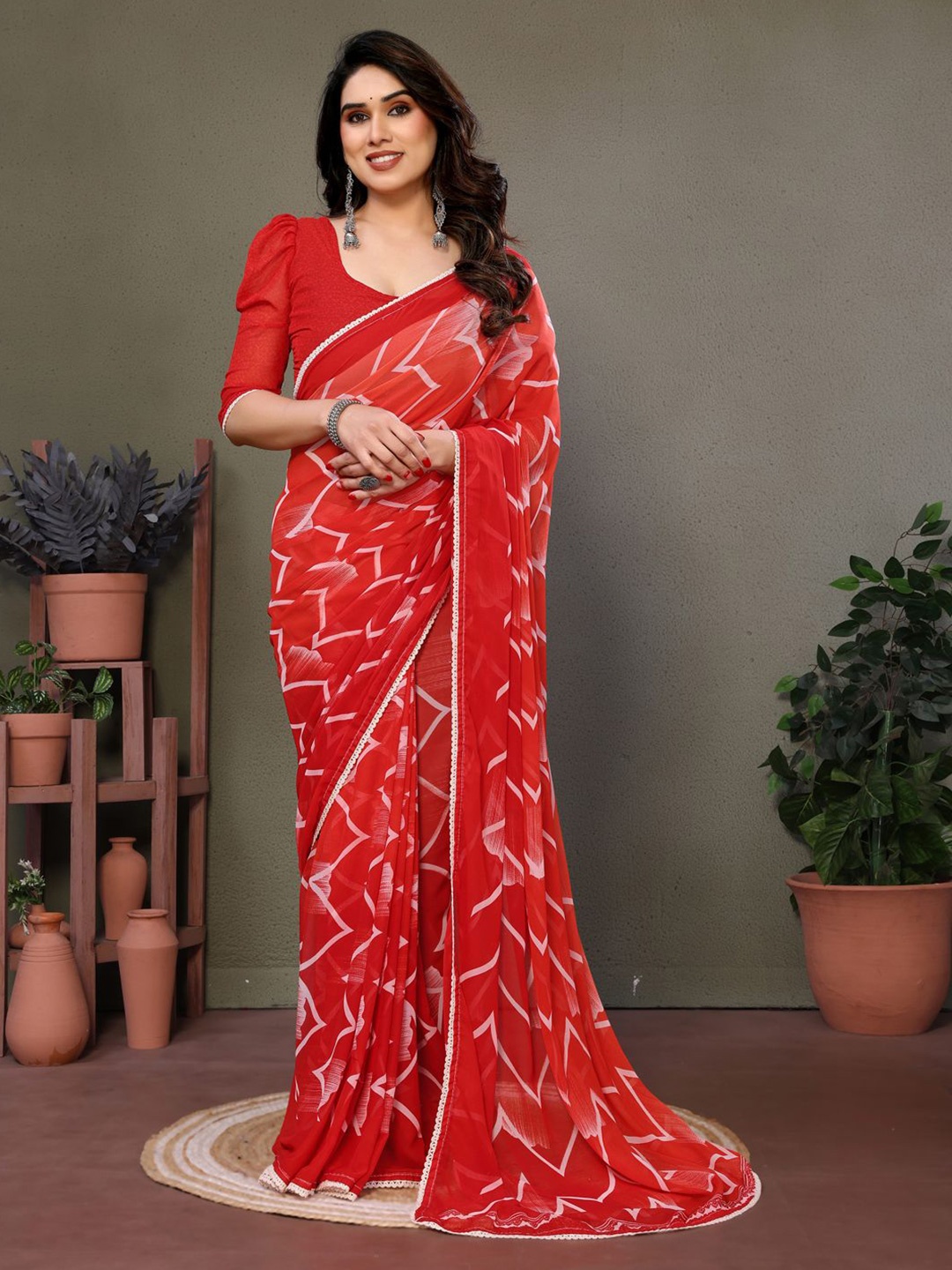 

DIVASTRI Embroidered Pure Georgette Block Print Saree, Red