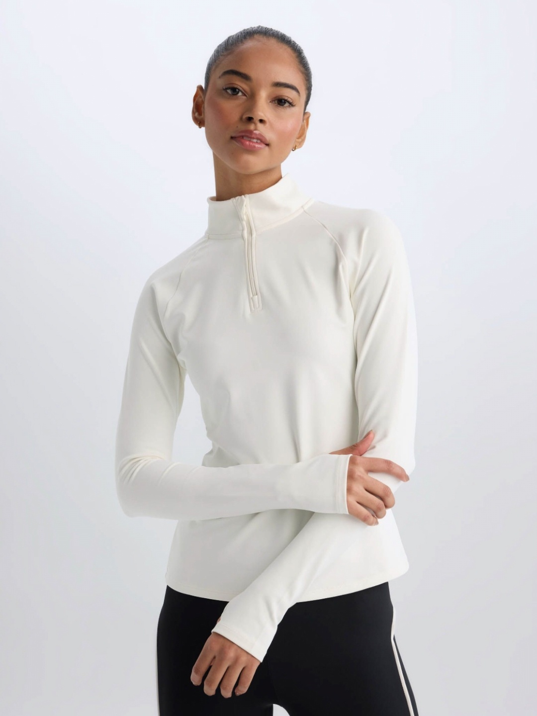 

DeFacto Women Solid Henley Neck T-shirt, Off white