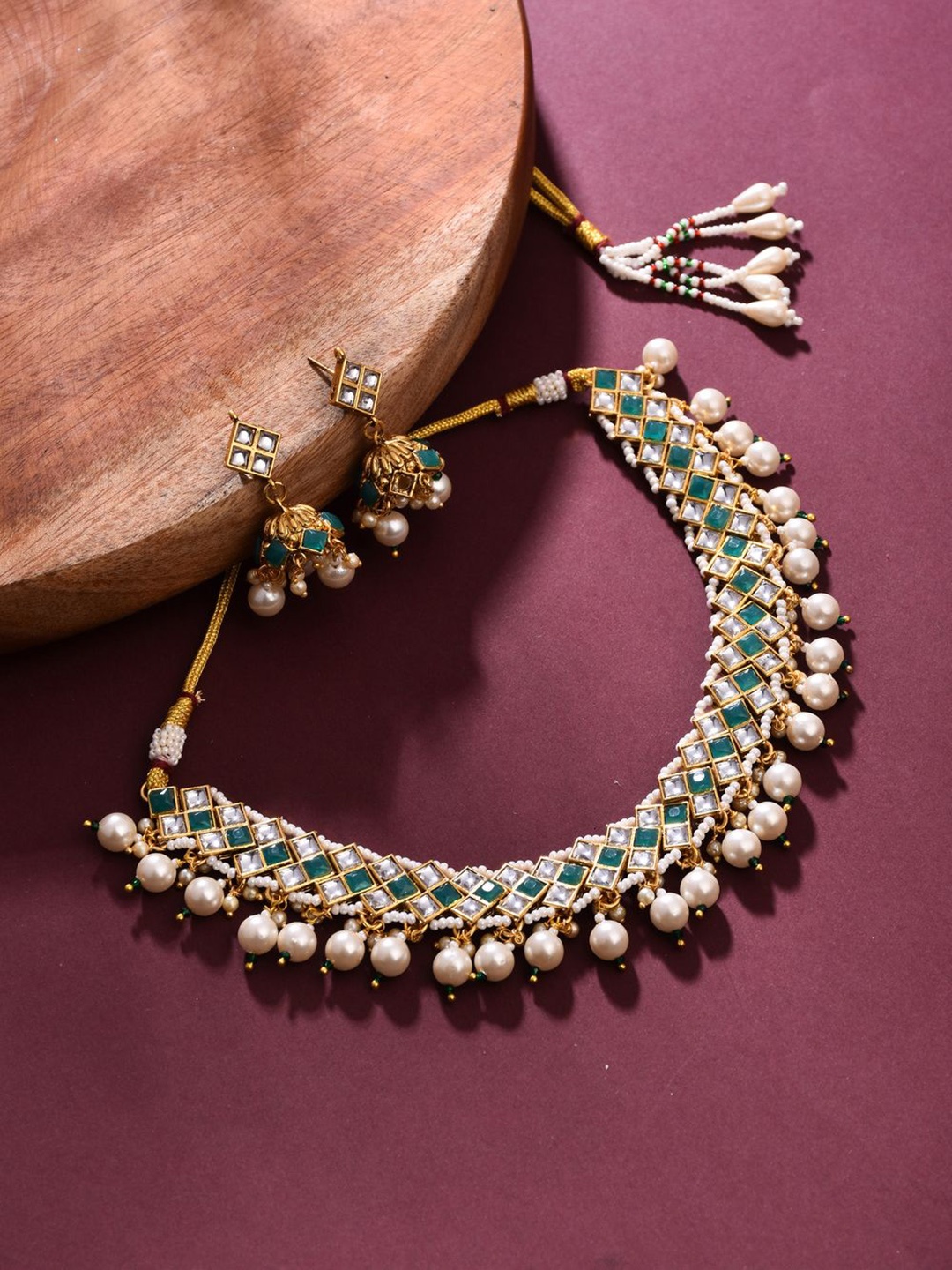

Anvik Gold-Plated Artificial Stones Studded And Beaded Neckless And Earrings