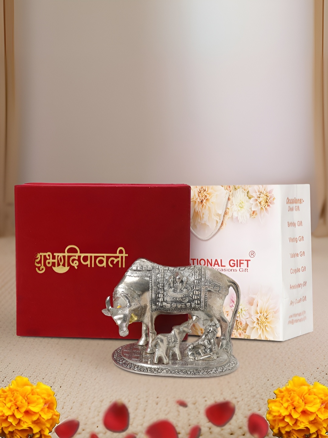 

INTERNATIONAL GIFT Silver-Toned Kamdhenu Cow Religious Idol Showpiece