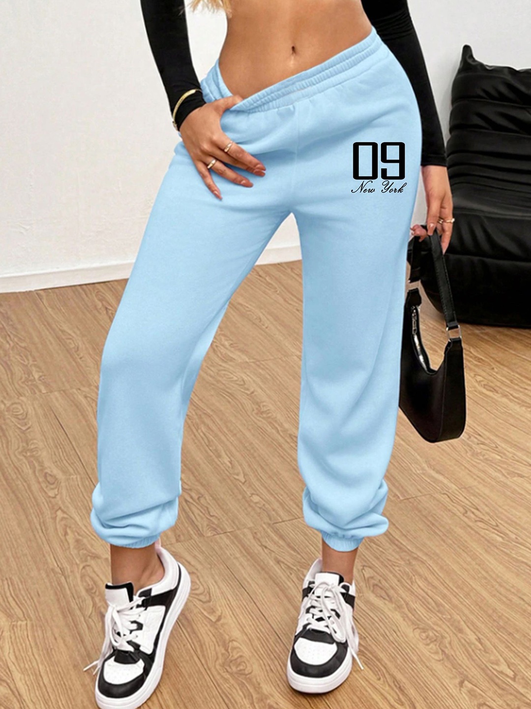 

SAAHASAM Women Printed Relaxed Loose Fit Joggers Trousers, Blue