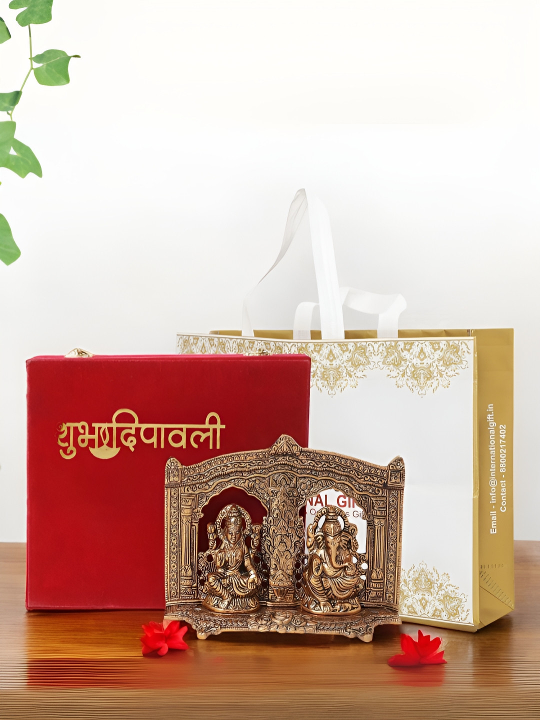 

INTERNATIONAL GIFT Brown Laxmi Ganesh Religious Idol Showpiece