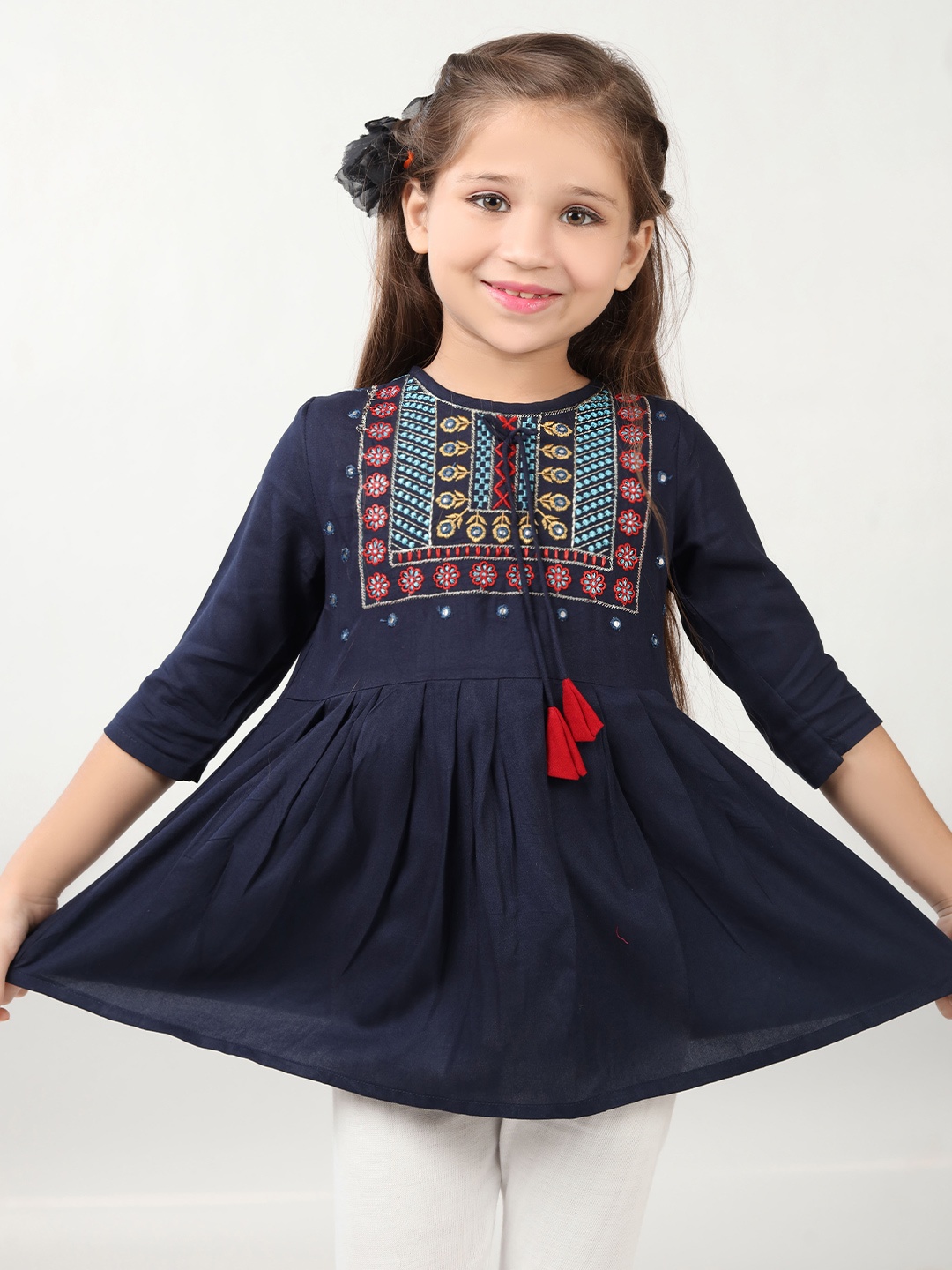 

Ishti Girls Floral print Embroidered Round Neck Top, Navy blue