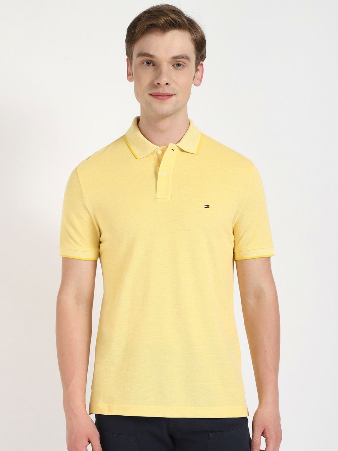 

Tommy Hilfiger Men Solid Polo Collar Cotton T-shirt, Yellow