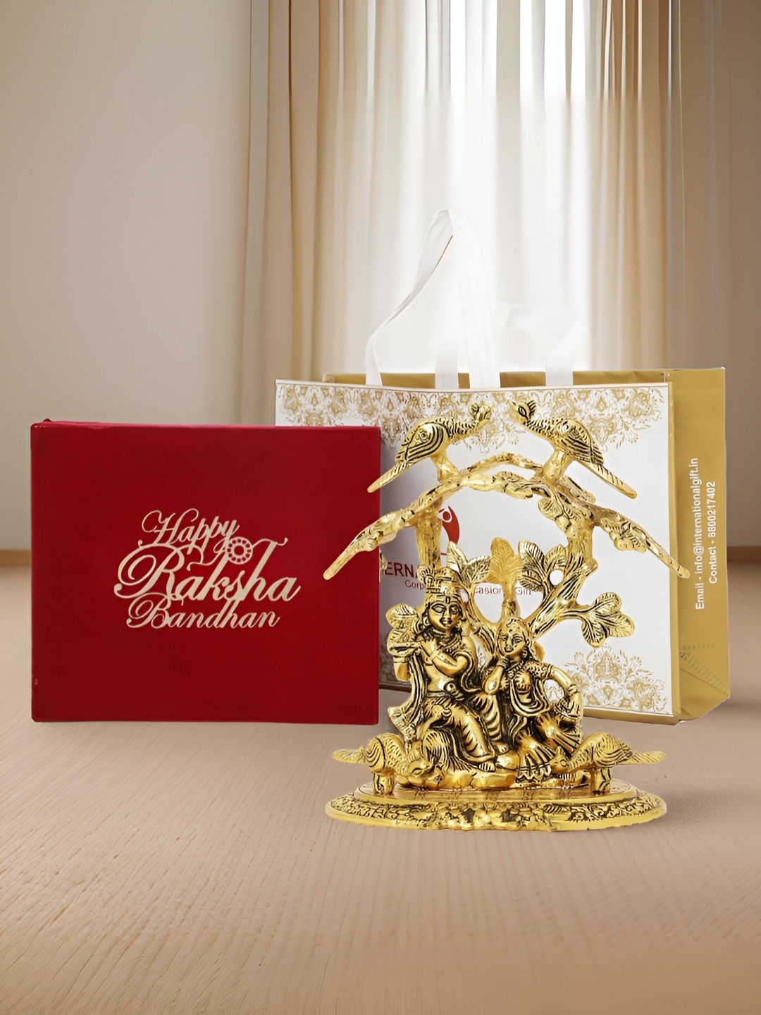 

INTERNATIONAL GIFT Gold Plated Radha Krishna Idol with Velvet Box and Raksha Bandhan Tag