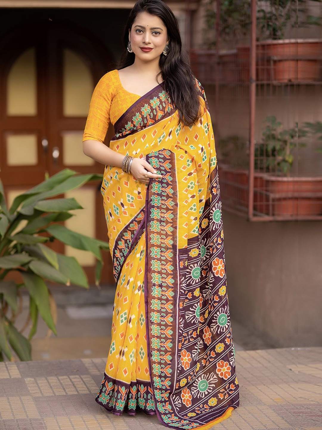 

Mitera Women Ethnic Motifs Printed Ikat Saree With Blouse Piece, Yellow