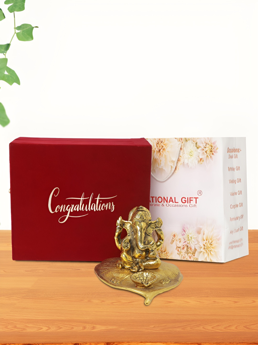

INTERNATIONAL GIFT Gold-Toned Lord Ganesh On Patta Religious Idol Showpiece