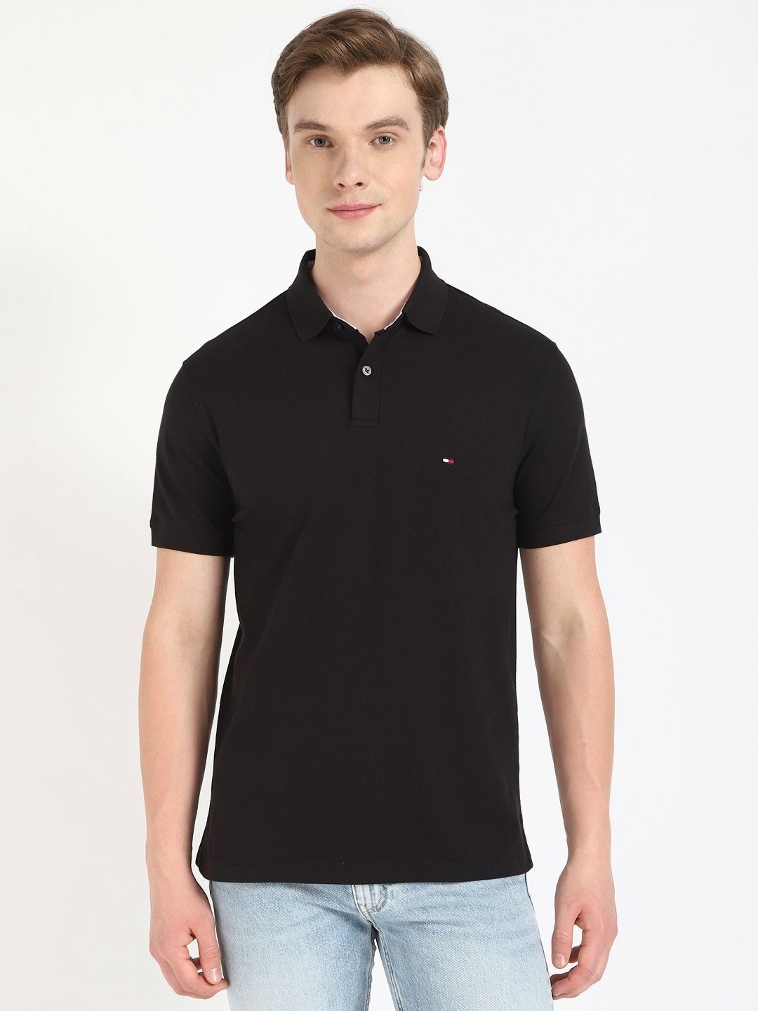 

Tommy Hilfiger Men Solid Polo Collar Cotton T-shirt, Black