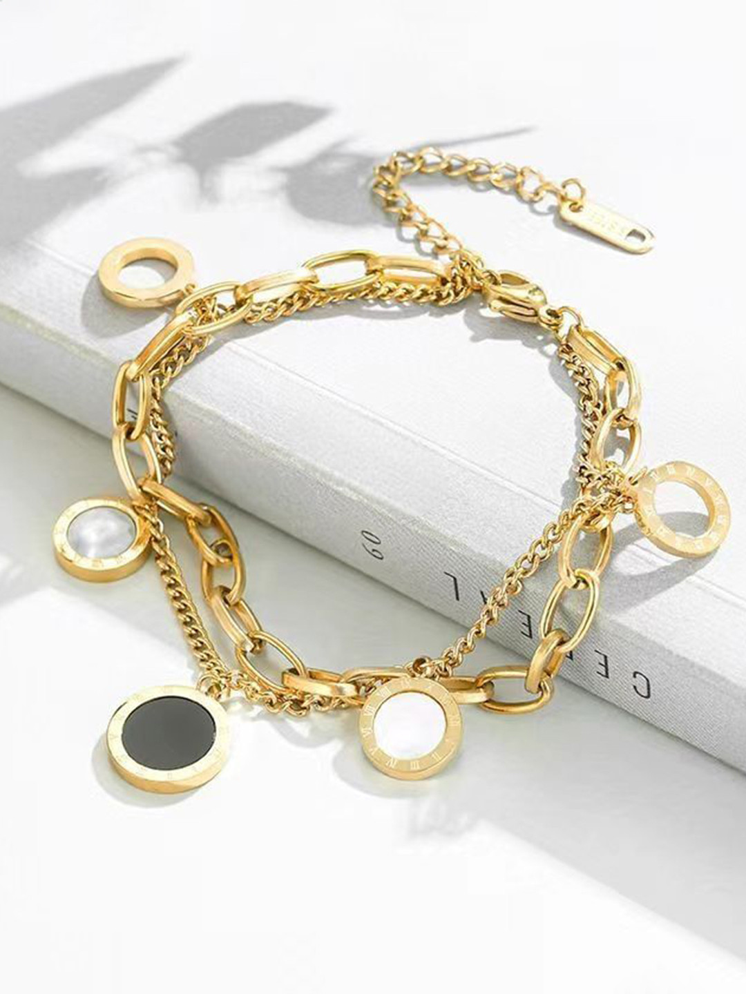 

Zabby Allen Roman Stainless Steel Gold-Plated Artificial Stones Studded Charm Bracelet