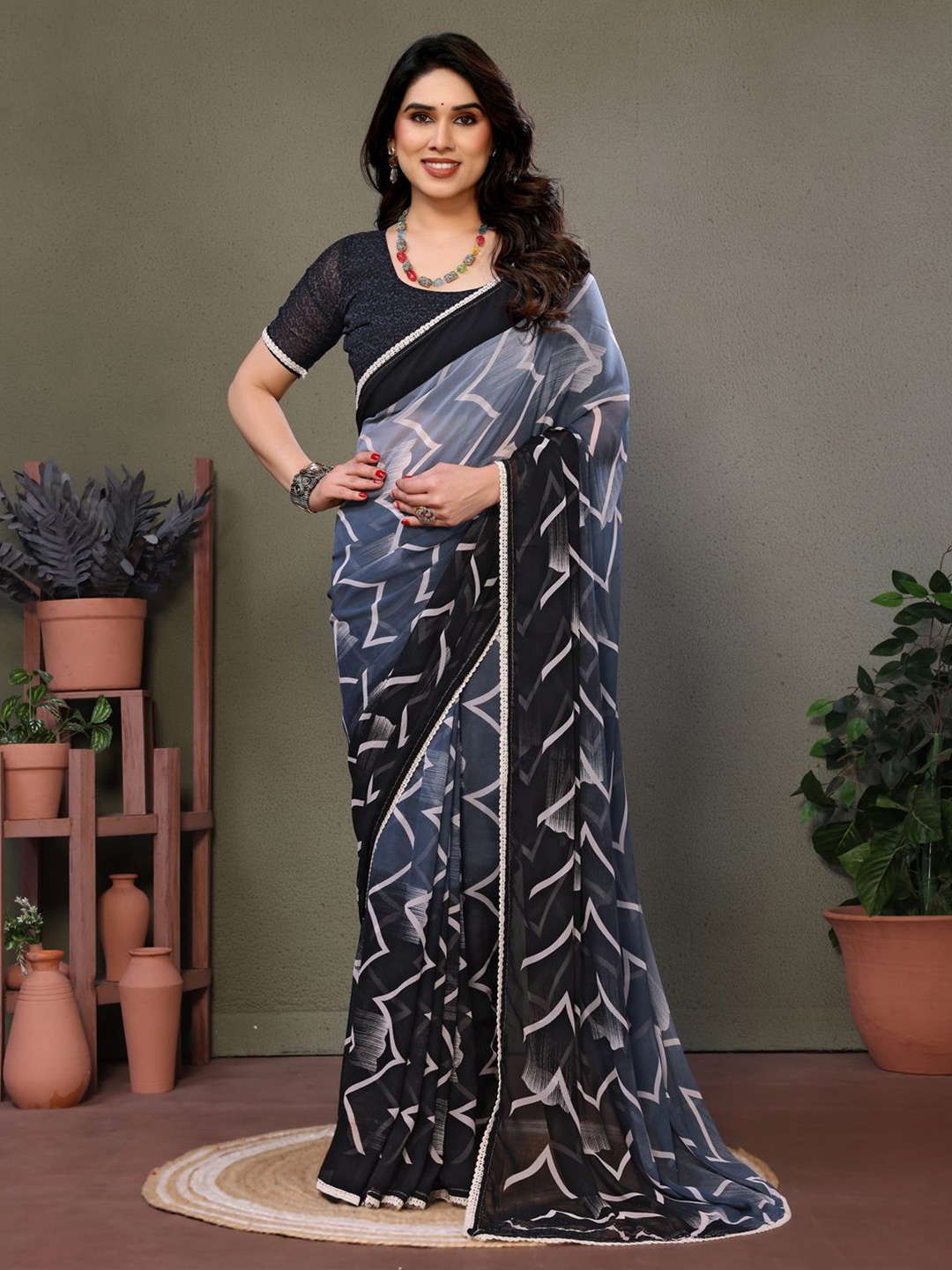 

DIVASTRI Printed Embroidered Pure Georgette Saree, Grey