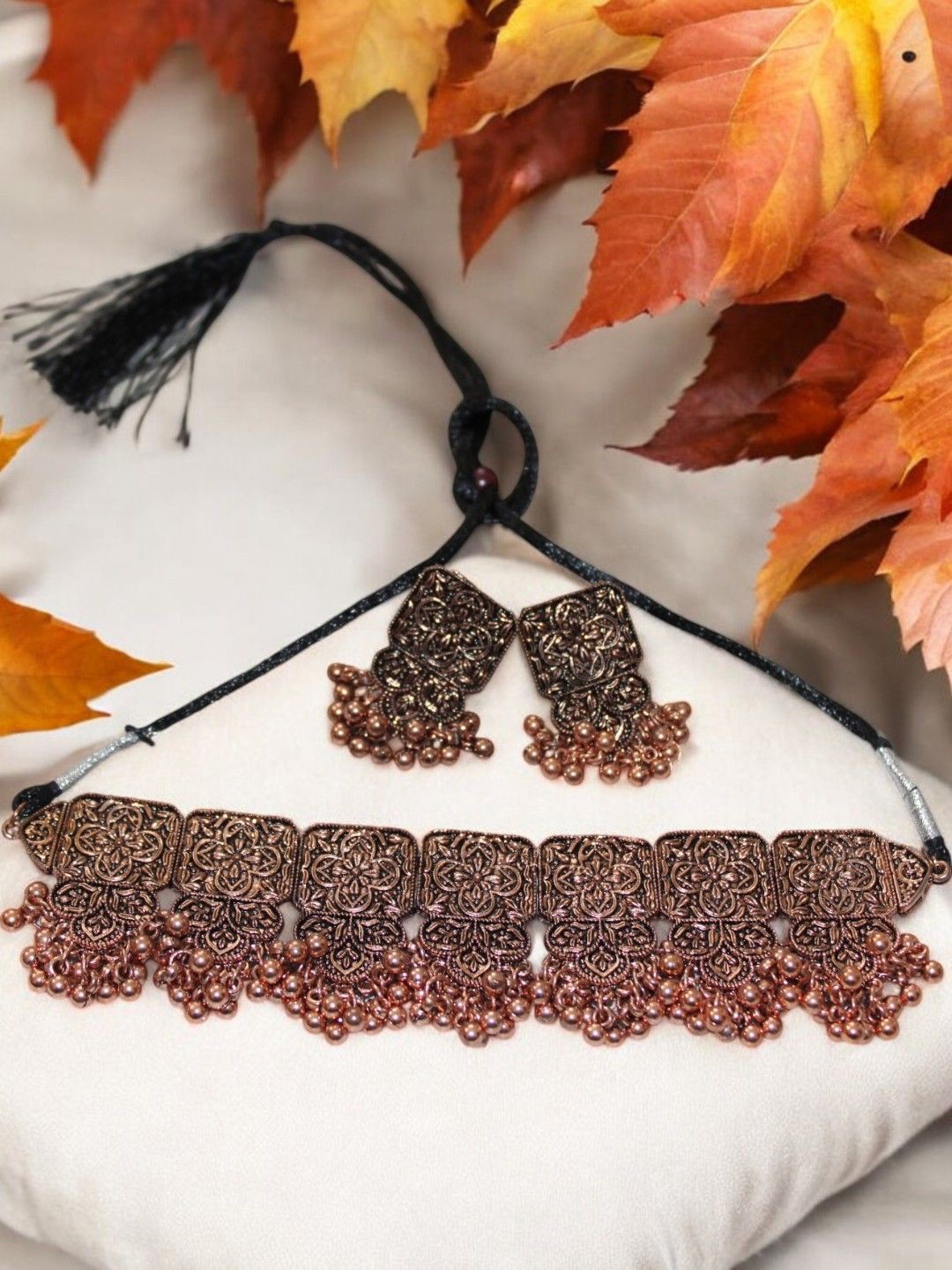 

Jolly Faces Copper-Plated Necklace And Earrings