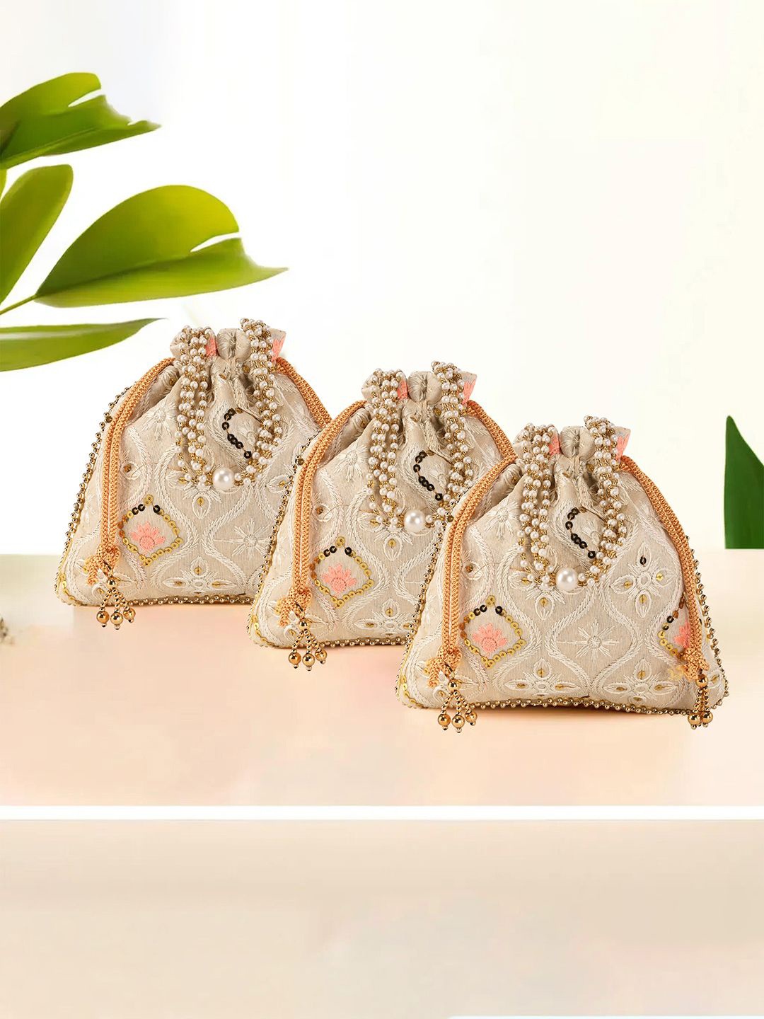 

Kuber Industries 3 Pieces Pearl Embroidered Potli Clutchs, Cream
